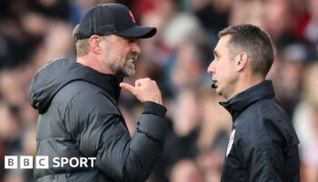 Jurgen Klopp and David Coote exchange words during a game at Southampton in May 2022