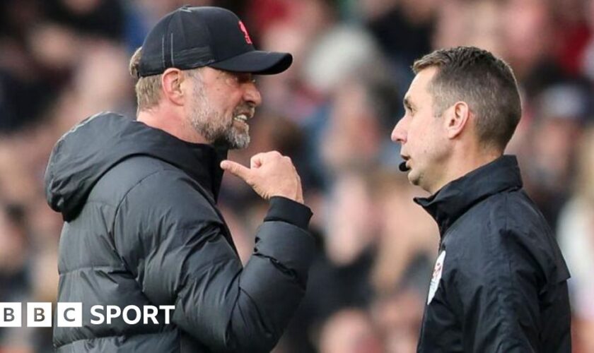 Jurgen Klopp and David Coote exchange words during a game at Southampton in May 2022