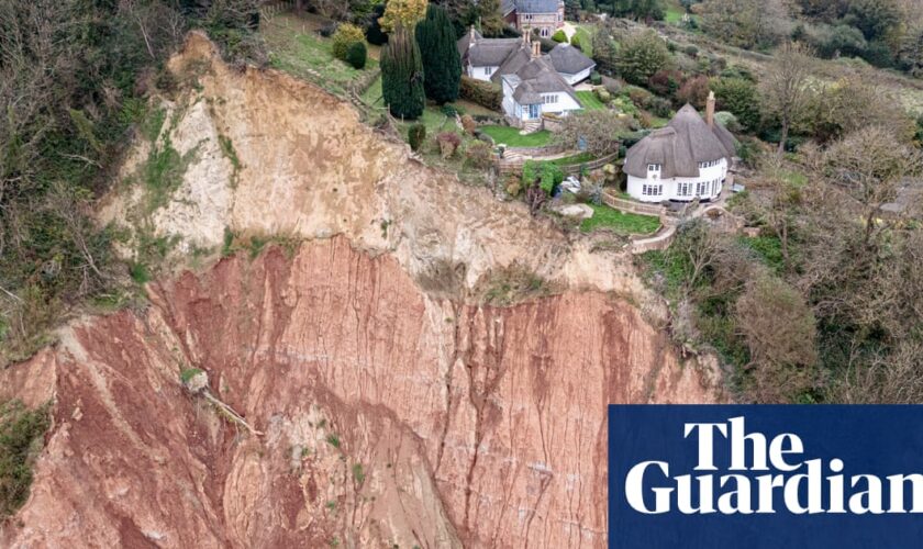 Devon cliff collapse leaves Sidmouth cottage teetering by 400ft drop