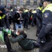 Dozens detained after protesters defy ban in Amsterdam