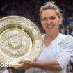 Simona Halep of Romania holds the trophy at Wimbledon