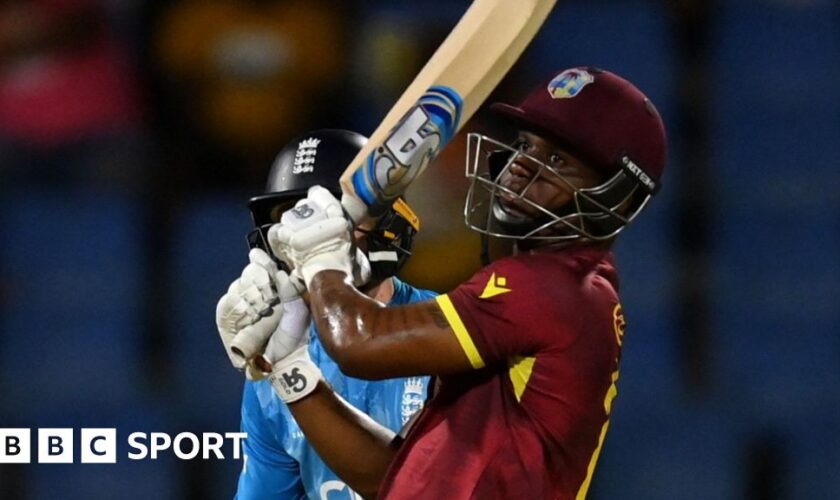 Evin Lewis hits a boundary against England