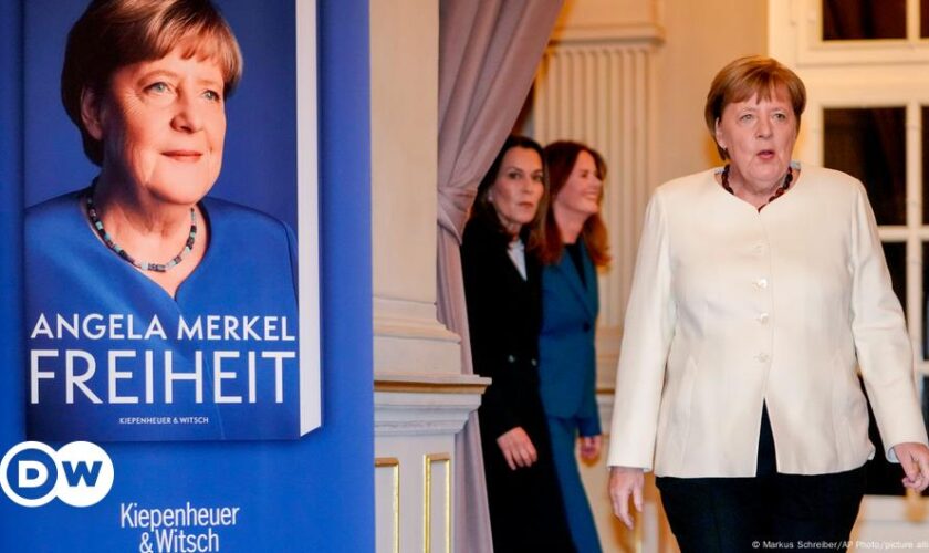 Merkel defends controversial decisions at book launch