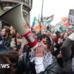 Pro-Palestinian demonstrators march through London