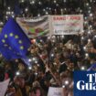 Protests in Georgia over disputed vote as PM threatens to ban opposition