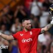 England opener Phil Salt raises his bat and helmet after hitting a century