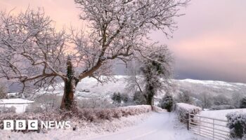 Snow closes 130 schools and shuts roads