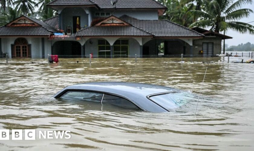 Three dead and 120,000 evacuated after floods hit Malaysia