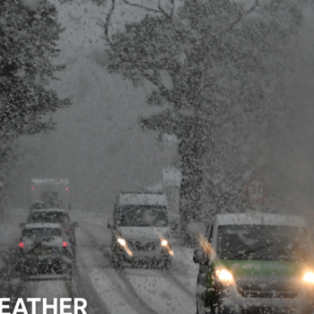 Vehicles navigate snowy conditions near Glenmore on the road to the Cairngorm ski area