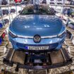 VW workers offer pay cut, threaten strike over crisis