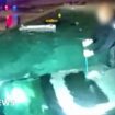 Watch: Moment police officer rescues man trapped in submerged car