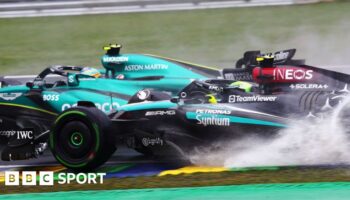 Spray comes up from Lewis Hamilton's Mercedes as he attempts to pass Aston Martin's Fernando Alonso during the 2024 Sao Paulo Grand Prix