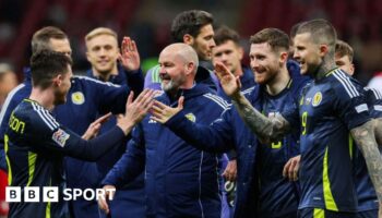 Steve Clarke joins in the celebrations after a dramatic 2-1 win over Poland