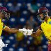 Evin Lewis and Shai Hope bump fists during their partnership of 136 v England