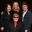 Elton John's battle with blindness: How 77-year-old star's husband David Furnish guided him around premiere as he was supported by stars including Liz Hurley after revealing he 'can't see'