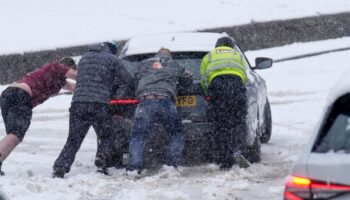 Met Office warns of difficult driving conditions as Brits wake to snow and ice