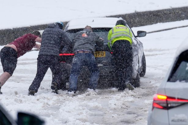 Met Office warns of difficult driving conditions as Brits wake to snow and ice