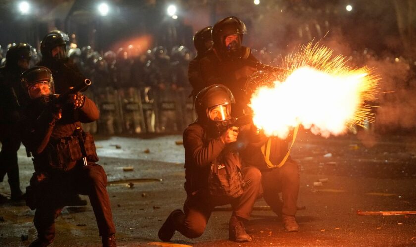 Police fire tear gas towards protesters in the Georgian capital Tbilisi. Pic: AP