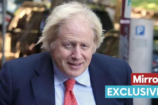 Boris Johnson losing signature blonde mop as unfortunate wind gust exposes receding hairline