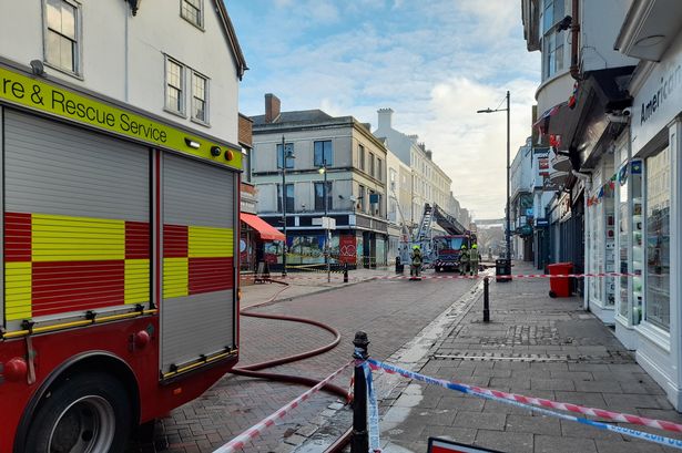 Girl, 12, arrested over Debenham's fire after blaze rips through Canterbury store