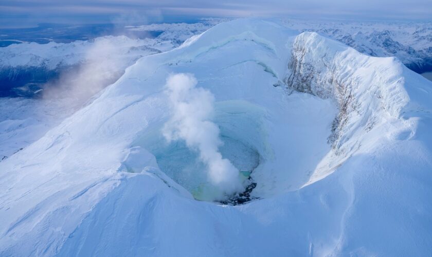 Mount Spurr is a 11,100ft (3,383m) stratovolcano around 80 miles (129km) away from the city of Alaska. Pic: Alaska Volcano Observatory, US Geological Survey/AP