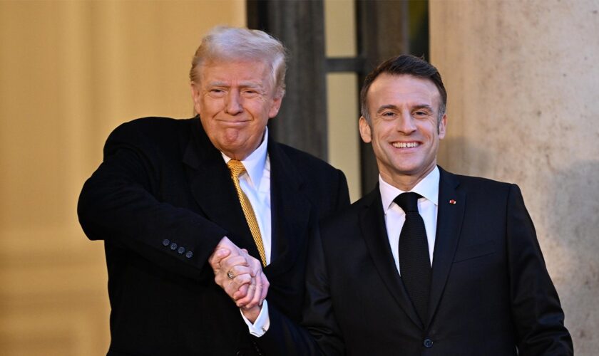 Social media reacts to Trump 'dominating world leaders' with Macron handshake during meeting in France