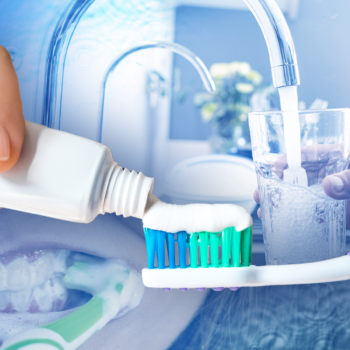 Why is fluoride in drinking water controversial?