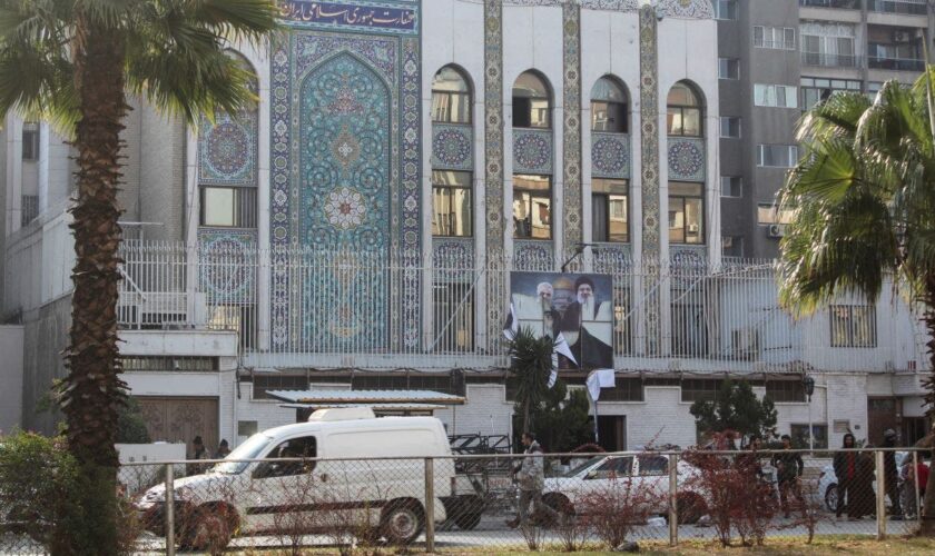 Gunmen storm Iranian embassy in Damascus as Russia claims Assad left 'instructions' to 'transfer power'