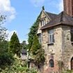 The luxury hotel that has housed migrants for THREE YEARS: How beautiful 16th century country manor with four poster beds and lake views is being used by asylum seekers