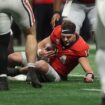 Georgia's Gunner Stockton takes huge hit in SEC title game, helmet flies off