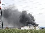 Moment fuel depot goes up in flames: Two dead and dozens injured after inferno at Italy oil company