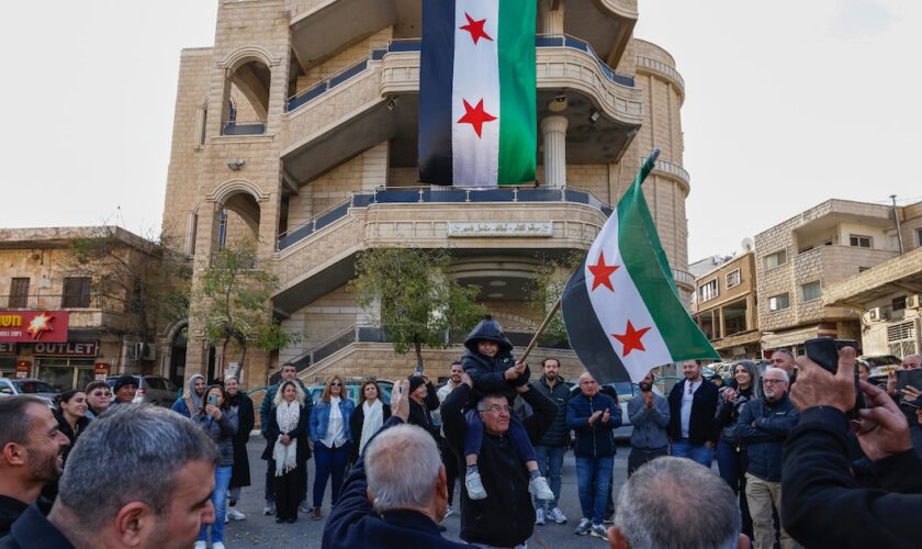 Les habitants de la ville druze de Majdal Shams, sur le plateau du Golan syrien annexé par Israël, après la chute du président Bachar al-Assad, le 8 décembre 2024