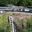 File photo dated 13/08/20 of emergency services inspecting the scene near Stonehaven, Aberdeenshire, following the derailment of the ScotRail train which cost the lives of three people. Prosecutors are considering whether Network Rail will face charges over a train crash which claimed three lives. Issue date: Thursday January 26, 2023.