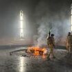 Tomb of Bashar al-Assad's father is set on FIRE by screaming Syrian rebels