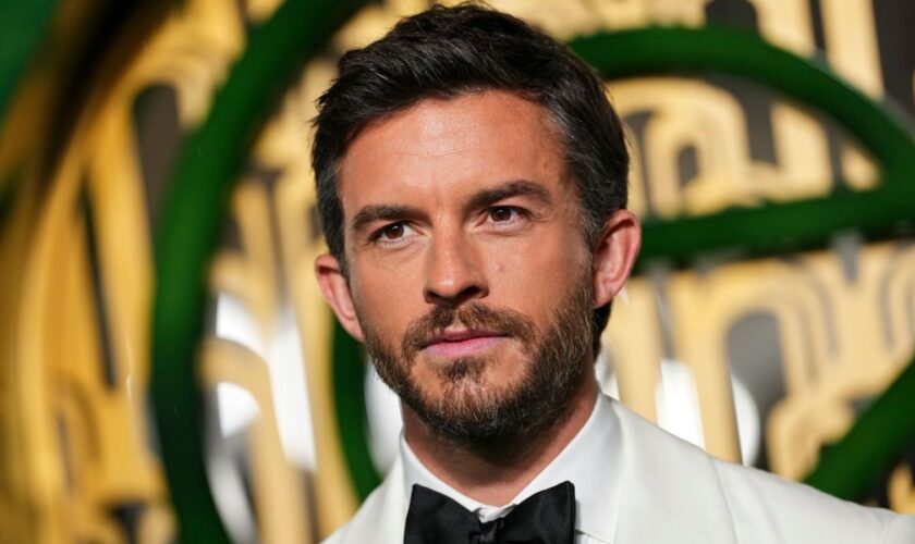 Jonathan Bailey poses for photographers upon arrival at the premiere of the film 'Wicked' on Monday, Nov. 18, 2024, in London. (Photo by Scott A Garfitt/Invision/AP)