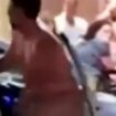 Wild moment naked man on 'rampage' sticks tongue out at stunned onlookers