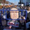 A caricature of South Korea's president is seen behind bars as protesters gathered to demand his impeachment today. Pic: AP