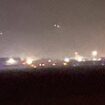 Shocking moment 'Putin's mystery drones' are spotted in the night sky over US airbase in Britain that is being lined up to house nuclear weapons