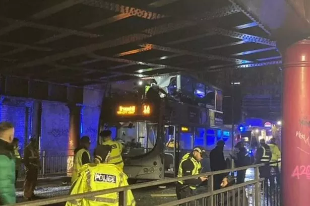 Double-decker bus crashes into Glasgow bridge with multiple injuries as man left with 'massive gash'