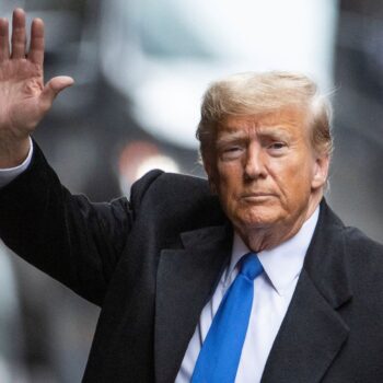 Former U.S. President Donald Trump greets to his supporters, as he arrives from his second civil trial after E. Jean Carroll accused Trump of raping her decades ago, outside a Trump Tower in the Manhattan borough of New York City, U.S., January 25, 2024. REUTERS/Eduardo Munoz