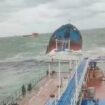 Two Russian tankers damaged in storm and crew member dead and leaking oil in Kerch Strait