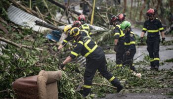 Rescue workers operate in storm-hit Mayotte, France, in this handout image obtained by Reuters on December 16, 2024. UIISC7/Securite Civile/Handout via REUTERS THIS IMAGE HAS BEEN SUPPLIED BY A THIRD PARTY. NO RESALES. NO ARCHIVES