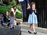 Princess Lilibet looks VERY similar to her cousin Princess Charlotte in Prince Harry and Meghan Markle's 'holiday' card - as royal fans spot sweet parallel