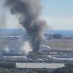 Terrifying moment plane crashes into building near Honolulu airport killing two as chilling audio transmission reveals pilot's five final words