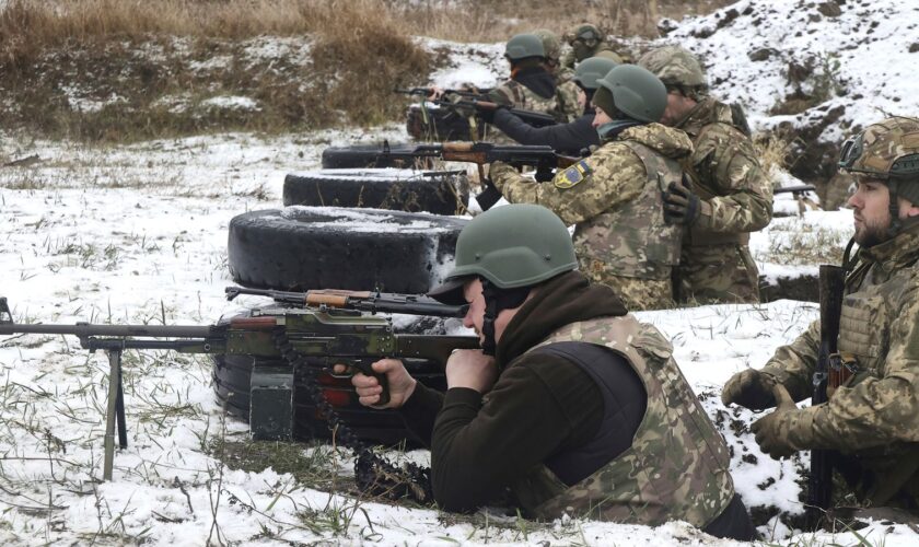 Ukrainian citizens get weapons training in Kharkiv earlier this month. Pic: AP