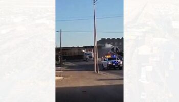 Texas train derails after hitting tractor-trailer, barrels into city building: video