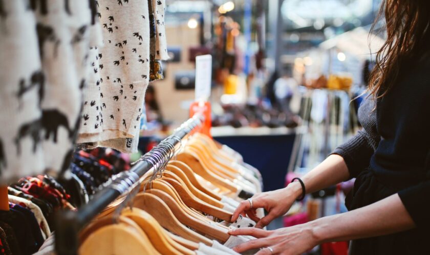 Woman shopping in East London second hand marketplace