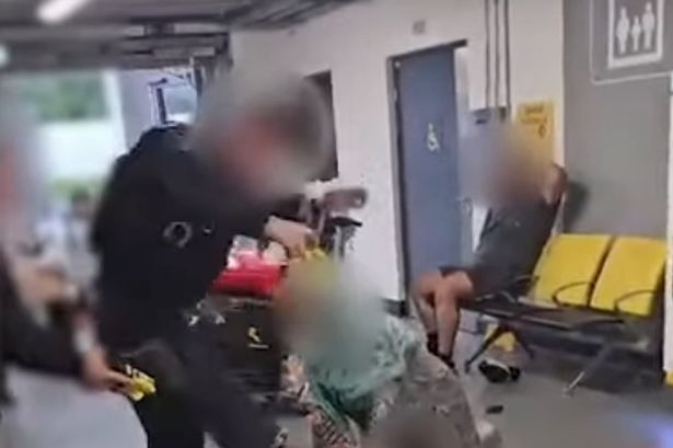 Manchester Airport: Two men charged over clash with police in video – but cops escape prosecution