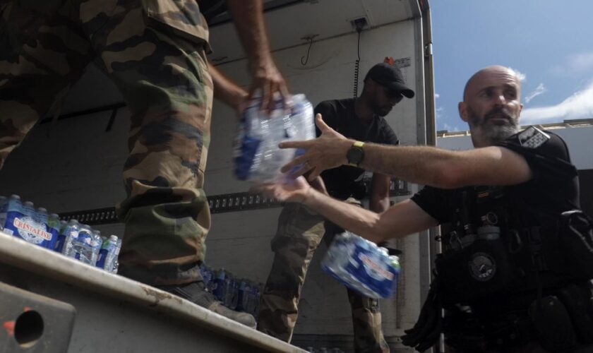 Water being distributed to locals in the aftermath of the cyclone