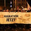 Furious German protesters take to the streets to demand mass deportations as anger at Angela Merkel's 'open doors' immigration policy rises in aftermath of Christmas market attack by Saudi doctor which killed five people including nine-year-old boy